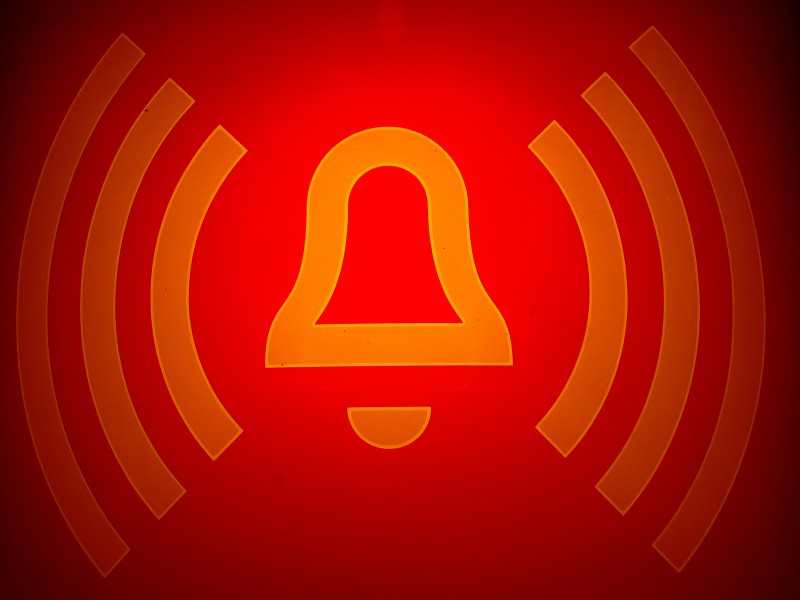 Alarm sounding to notify the alarm system communicators